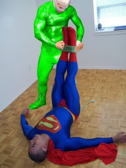 Superman is unconscious after intense kryptonite radiation .The Kryptonite Man won !