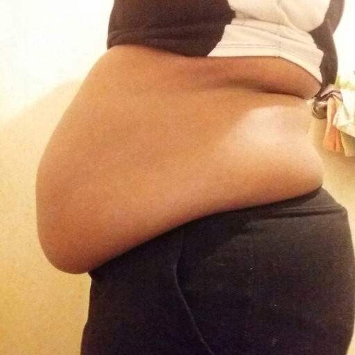 ebonybelliescentral-deactivated:greedygainergirl-deactivated202:Last week’s belly. Ate 4 sushi rolls chased with beer. Gahtdamn. @greedygainergirl so suffed the belly button popped out 😮‍💨