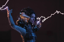 steampunktendencies:  Metal Plated Faraday Cage Dress with Spiked Helmet and Plasma Ball Shoulder Pads by Anouk Wipprecht