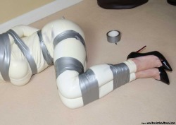 gaggedgirls: I love it when the roll of duct tape is left next to a girl after she has been bound and gagged with it
