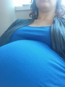 nerdynympho87:  Officially 28 weeks pregnant! (I’m not THAT gigantic, but I’m slouching in a chair, so it looks that way)  