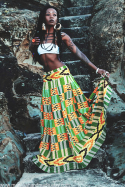 manakahandmade:  One of a kind African Bohemian ruched skirt handmade from high quality printed Kente Fabric. The picture says it all… Feminine and full… I have used several yards of fabric to create some drama. With 8 wide panels, this skirt really