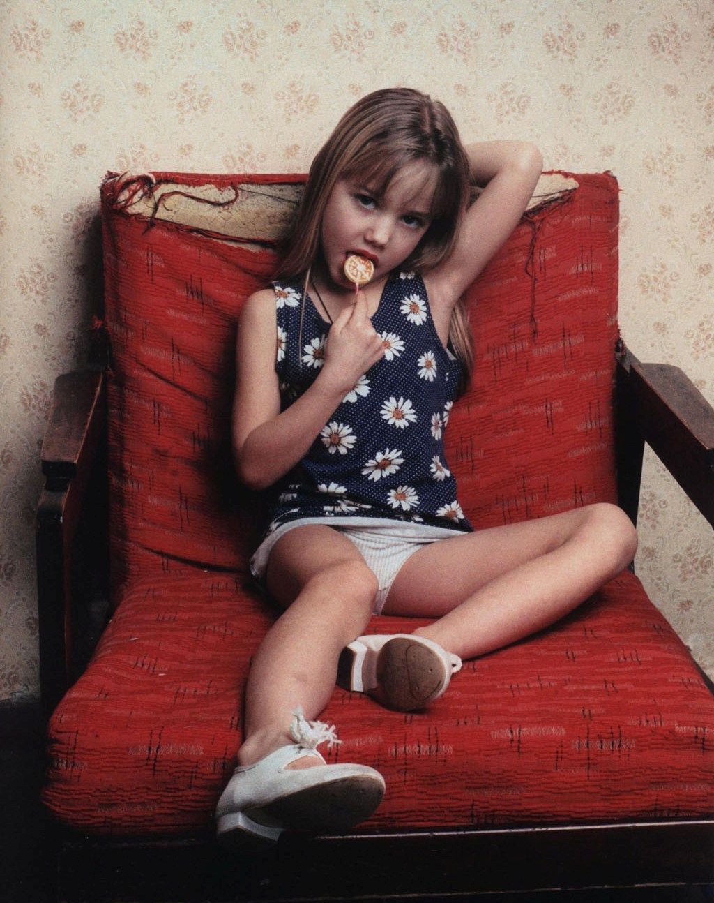 Young little girl smoking