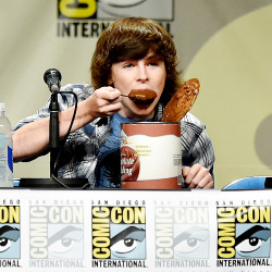 thewalkinggifs:  Chandler Riggs attends AMC’s ‘The Walking Dead’ panel during Comic-Con International 2014 at San Diego Convention Center on July 25, 2014 in San Diego, California. 