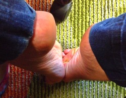 sexyitalianchick619:  My wrinkled soles and arches under my work desk. Would you like to slide anything in between my feet? Mmmm….