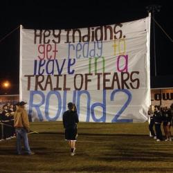 hawtistic:  tsisqua:  unsaidwarning:  blackinasia:  (Image description: football banner being held up which reads, “Hey Indians, get ready to leave in a Trail of Tears Round 2”) fiftyfourfortyorfight:  Last night, this sign went up at a McAdory High