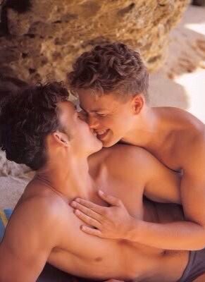 Cute gay couples in love kissing