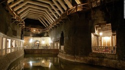 placesandpalaces: Wieliczka salt mine, Poland In southern Poland, Lake Wessel lies inky and unmoving in the deep. Filling the bottom of an old salt mine, it’s just one component of the UNESCO World Heritage Site which has been a functioning mine since