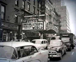  SINNER-AMA BURLESK  —  STRIPS Around The WORLD A vintage photograph from 1958 features traffic out front of the ‘TIMES Theatre’ marquee, in New York City..  