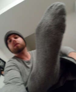 muscledomination:  bootslaveboyusa:  Yeah I know you’re dazed and out of it faggot, all sock sniffers like you get hypnotized by MY smelly socked feet like that.  And I’VE been wearing these socks on and off ALL WINTER, when it’s really cold or