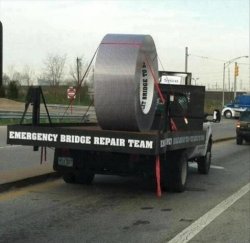 Is that a giant roll of DUCT TAPE?!?  :}