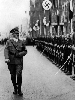 adolfi:  Hitler walking past a guard of honour of the `Leibstandarte Adolf Hitler’ (Hitler’s personal bodyguard regiment) - September 1935. 