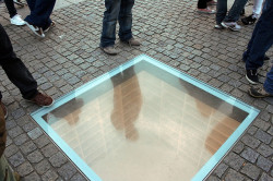 hallowshorror: anotherlgbttumblr:  kp-ks:  Book Burning Memorial ‘In the center of Bebelplatz, a glass window showing rows and rows of empty bookshelves. The memorial commemorates the night in 1933 when 20,000 “anti-German” books were burned here