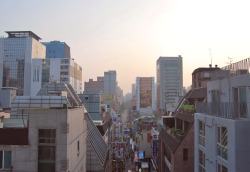 the-seoul-rolls:  One advantage of working late: watching the sun set from the office rooftop.  