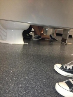 awesomephilia:  Aww, there’s a girl proposing to a guy in the bathroom!  