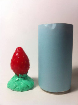 fantasytoymasterlist: The Cake Dildo and the Strawberry and Chocolate-Dipped Strawberry Butt Plugs, as well as an example of a three-color pour on the Tentacle Dildo from LovecraftersToys on Etsy.