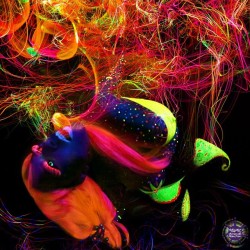 fire breather #londonandrews #blacklight #ultraviolet #plur #lightart #plusmodel #smoke #psychedelic