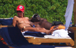 toplessbeachcelebs:  Heidi Klum (Model) sunbathing topless in Sardinia (August 2011) - Part I