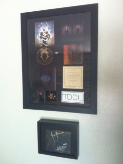 Got my TOOL Opiate reissue framed today,put the autographed jacket in a  shadow box. LOVE!