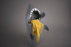 ianbrooks:  Shark Felt Laundry Hamper by Jolanta Uczarczyk I’m already convinced the washer eats most of my socks, might as well complete the metaphor and shift the blame to another inanimate object with this hungry shark hamper, available at Etsy for