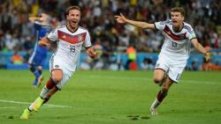 breakingnews:  Germany wins World Cup, 1-0, over Argentina Associated Press: Mario Goetze volleyed in the winning goal in extra time to give Germany its fourth World Cup title with a 1-0 victory over Argentina on Sunday.   Goetze controlled the ball