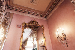 hawaiiancoconut:  Gold mirror &amp; pink wallpaper, Disneyland, by Emily Faulstich  