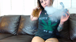 Kaylie from Mygirlfund smoking a bowl on her couch. It&rsquo;s 420 somewhere so, cheers!