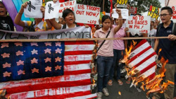 viletrollfiend:  Activists in the Philippines rallied outside the US embassy in the capital, Manila, and burnt US flag to express their anger over the killing of a woman by a US Marine. On Tuesday, the demonstrators demanded that Washington hand over