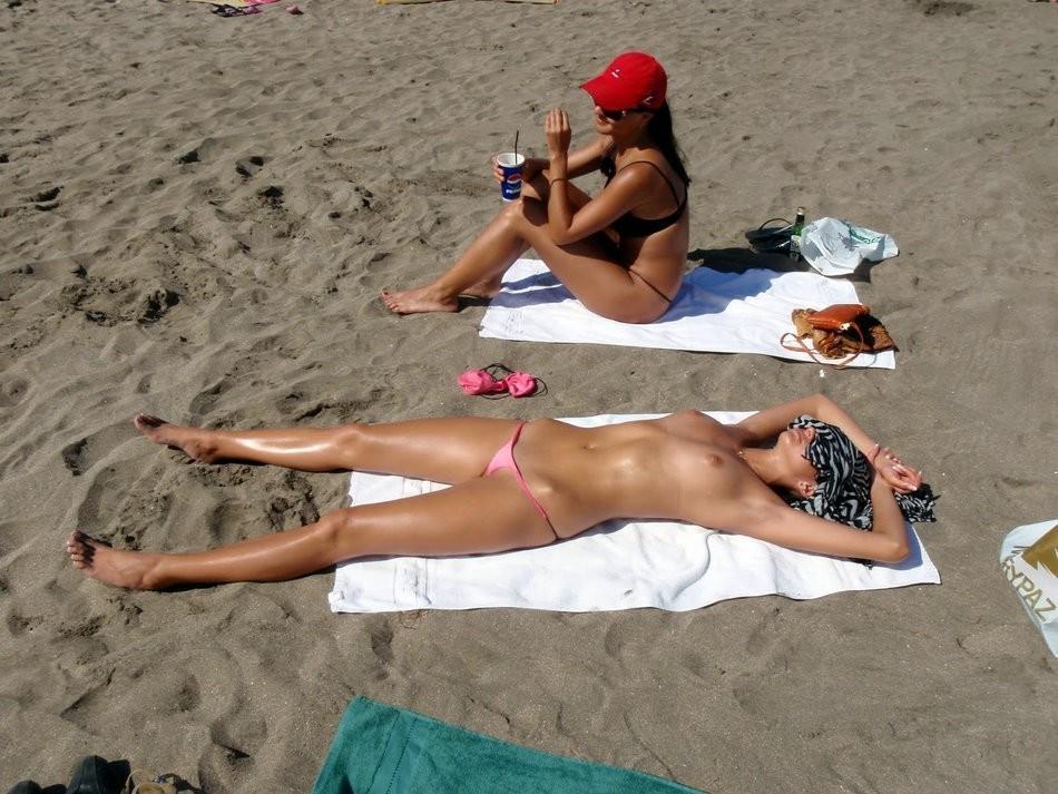Topless micro bikini beach