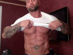 Anyone else notice Batista keeps tweeting quotes like  &ldquo;Down but never out&rdquo; &ldquo;One life&rdquo; &ldquo;Dream chaser&rdquo; Each with a different pic of him putting on a shirt!  Don&rsquo;t know what he is doing but this pic is hot! :p