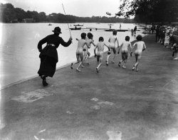 Police officer chases down a group of young skinny dippers in Hyde Park. 1926 