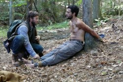 boundhung: Christopher Abbott is tied to a tree, shirtless and barefoot, by Australian gas-mask hunk, Joel Edgerton, in upcoming movie It Comes at Night. You can catch the whole movie trailer here 