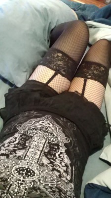 Skirts, fishnets, and thigh highs