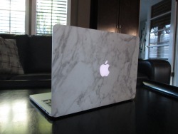 astonishingly:  My marble MacBook skin from UniqFind is the best! I use my MacBook all the time, so it gives it a clean &amp; stylish look to it.