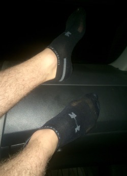 wowsexyfeet:  Since we aren’t driving I’m just going to put my feet on the dash. Is that ok with you?  Love the UA socks &amp; your hairy legs&hellip;superb