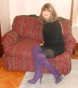 antonialovecd: Me, seated, facing right, without my glasses but wearing my black sweater dress from Love Culture as well as my purple over-the-knee Jahmesia boots from ShoeDazzle   embrace your beauty by living it