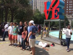 caliphorniaqueen:  bbyph4t:  thebluelip-blondie:  ras-al-ghul-is-dead:  A silent protest in Love Park, downtown Philadelphia orchestrated by performance artists protesting the murder of Michael Brown in Ferguson. The onslaught of passerby’s  wanting