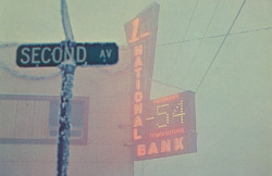cardboardamerica:  Fairbanks, Alaska The ice-fog obscures the famous thermometer at 2nd Ave. and Cushman as the temperature reaches 54 degrees below zero.  i definitely don’t miss this lol