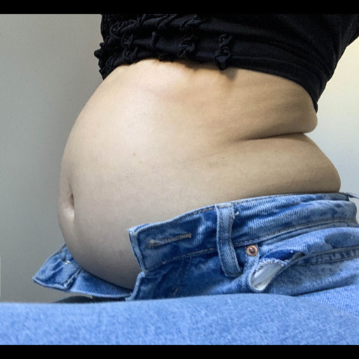 stuffingbelly:I can’t stop getting fatter. This is my empty belly (just a bit bloated from breakfast) and I can’t close these jeans! Last month they fitted&hellip;I eat more and more every day. My stomach is getting bigger and asking for more food&hellip;
