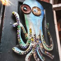 Bottlecap art will be worth more after the fallout. #fallout4 #fallout #art #modernart #streetart #NOLA #NewOrleans #tentacles #octopus #recycling #foundart #assemblage