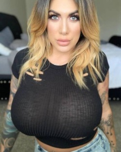 thebiggestever:Her already huge tits were growing again.  Her shirt, which was having a hard time containing her already, immediately started to tare.  It wasn’t long before her basketball sized tits busted right through it.  Seconds later her huge