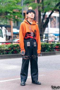 tokyo-fashion:  Tokyo high school student Makoto on the street in Harajuku wearing a remake style with Yu-Gi-Oh! Cards as accessories, a remake cropped painted hoodie, cutout pants, and Dr. Martens shoes. Full Look