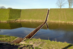 escapekit:  Moses Bridge This sunken bridge designed by Ro &amp; AD Architects from the Netherlands, has in fact parted waters. The bridge is in the Netherlands and it is the most practical and fun way of accessing the stunning 17th century fortress.