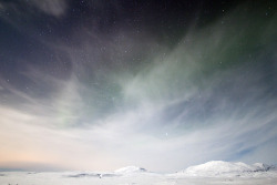 teenwitched:   Iceland, just the hint of the aurora looking out to the mountains beyond Thingvellir. A perfect night.  