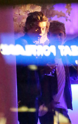 harrystylesdaily:  One Direction heartthrob Harry Styles pictured at the X Factor End Of Series party at 3:30AM with a mystery female friend. Harry and Niall were also seen drinking multiple drinks with Victoria Secret model Barbara Palvin and her friends