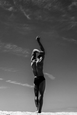 chriscruzism:  Model Chris Lylez represented by Silver Models and photographer Gregory Prescott come together for a super come back. Exuding a raw sensuality, a lean Chris hits the sand, modeling classic CK brief underwear in a black and white