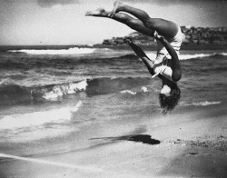 Ted Hood - Peggy Bacon in mid-air backflip, Bondi Beach, Sydney, 1937.