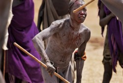   Ethiopia’s Omo Valley, by Olson and Farlow    The men brutally battle in the Donga (stick fight) and are often injured.  