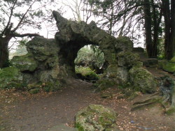 vwcampervan-aldridge:Mossy stone Hobbit like portal feature in the gardens of Elvaston Castle, Derbyshire, England.