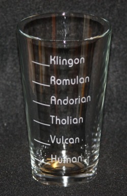 thedrunkenmoogle:  Star Trek Pint Glass Giveaway, Sponsored by FanBoyShirts With Star Trek: Into Darkness out in theaters, The Drunken Moogle and FanBoyShirts decided it would be an opportune time to give away a set of two Trek themed glasses. What